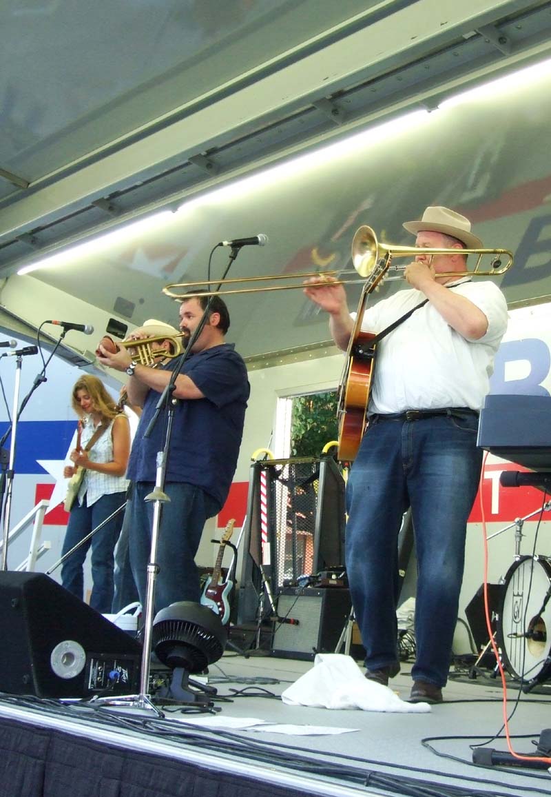 Photo of band members playing instruments